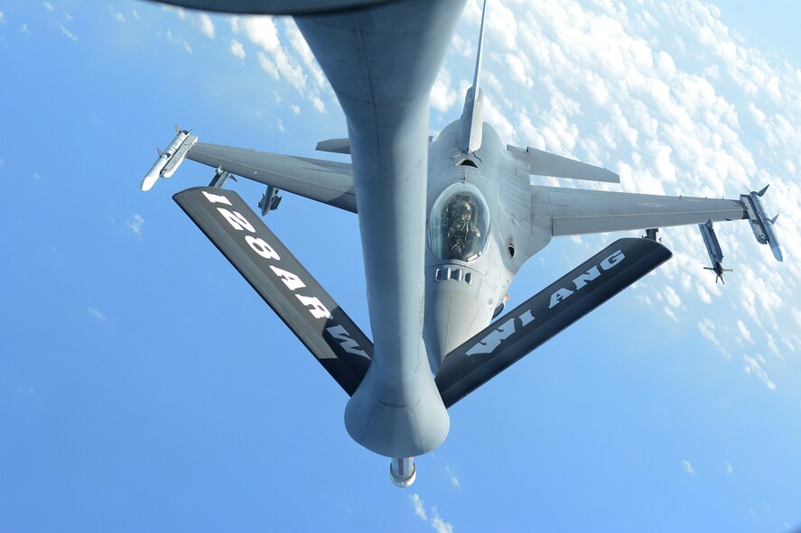 An Air National Guard F-16 Fighting Falcon assigned to the 115th Fighter Wing prepares to be fueled by a KC-135 Stratotanker during a training exercise near Key West, Fla., Feb. 5, 2014. The 115th FW came to Key West in February to reduce the likelihood of flight cancelations due to weather. The two-week deployment allowed pilots to test their expertise against dissimilar aircraft. (Air National Guard photo by Senior Airman Andrea F. Liechti)
