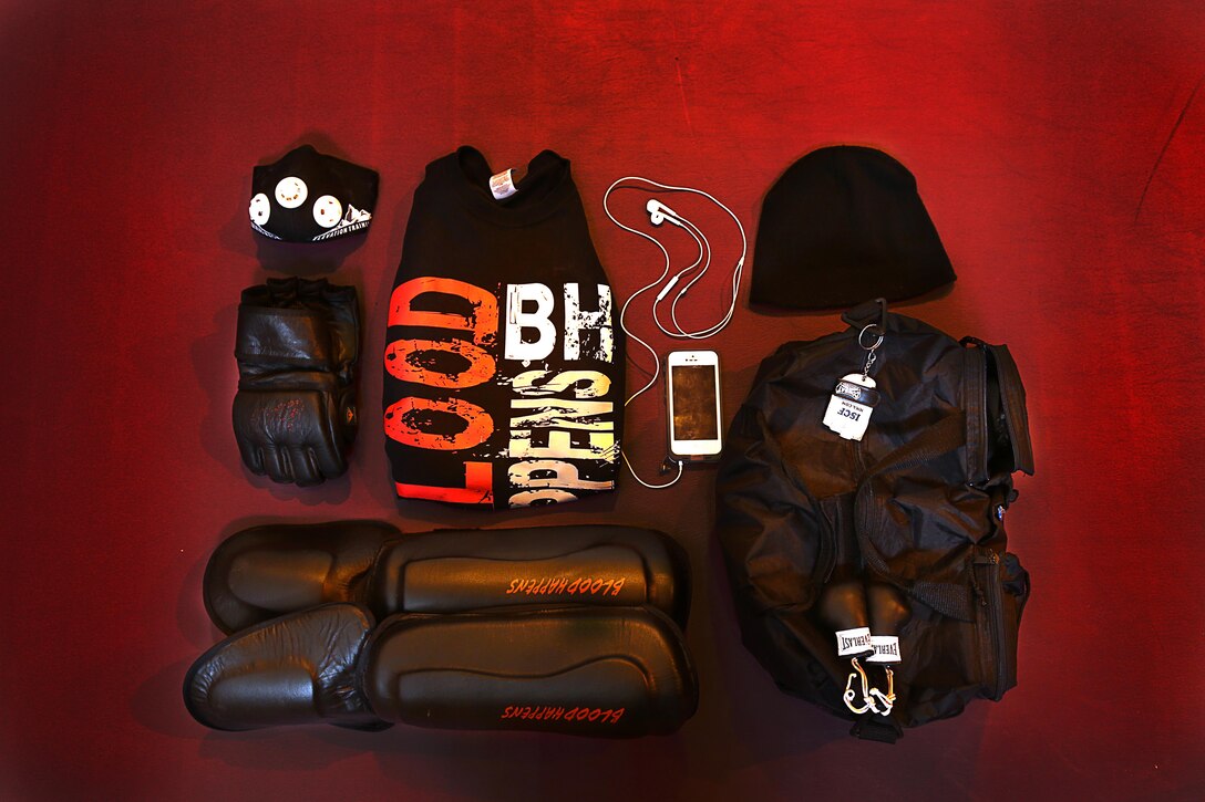 Sgt. Daniel Ramirez trains at more than 6,000 feet above sea level. These are a few items he is never without when training for his next fight; his sponsor's shirt, music, beanie and gym bag. Although he trains in an area with lower oxygen levels, he uses an oxygen depravation mask to intensify his cardiovascular training.


