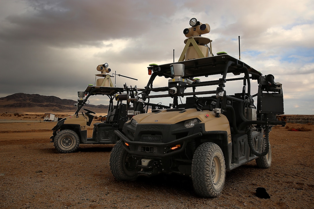 The Mobile Detection Assessment Response System surveys the area around the Combat Center's Expeditionary Airfield, Feb. 6, 2014. The MDARS can be equipped with weapon systems and can be adapted to the needs of the Air Base Ground Defense.
