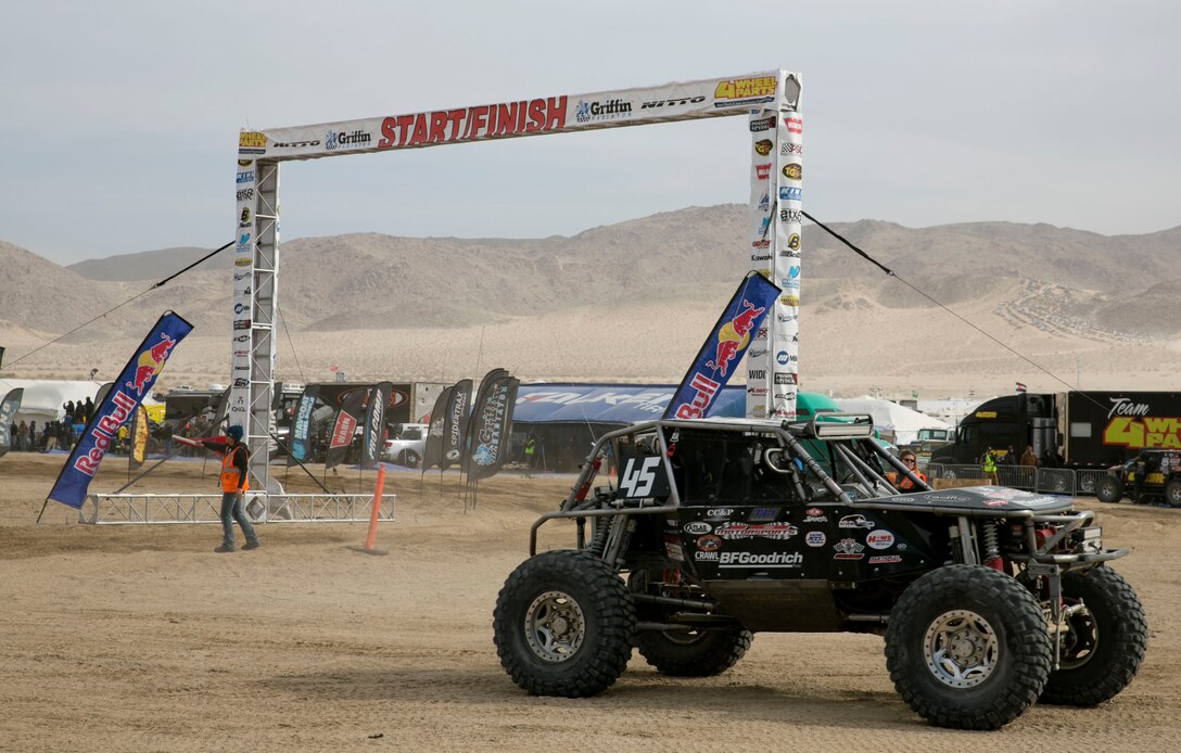 An Ultra 4 vehicle makes a pit stop during the final race of the 2014 King of the Hammers event in Johnson Valley, Calif., Feb. 7. During the final race, Loren Healy, the 2010 event winner, reclaimed his title by winning the 2014 event. (Official Marine Corps Photo By Lance Cpl. Kasey Peacock/Released)


