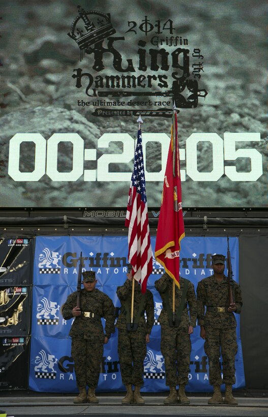 The Combat Center’s base color guard presented the colors during the final day of the 2014 King of the Hammers event in Johnson Valley, Calif., Feb. 7. Competitors in the event started the race side-by-side, with two vehicles taking off every 30 seconds, and had to complete the 165-mile course in less than 14 hours. (Official Marine Corps Photo By Lance Cpl. Kasey Peacock/Released)


