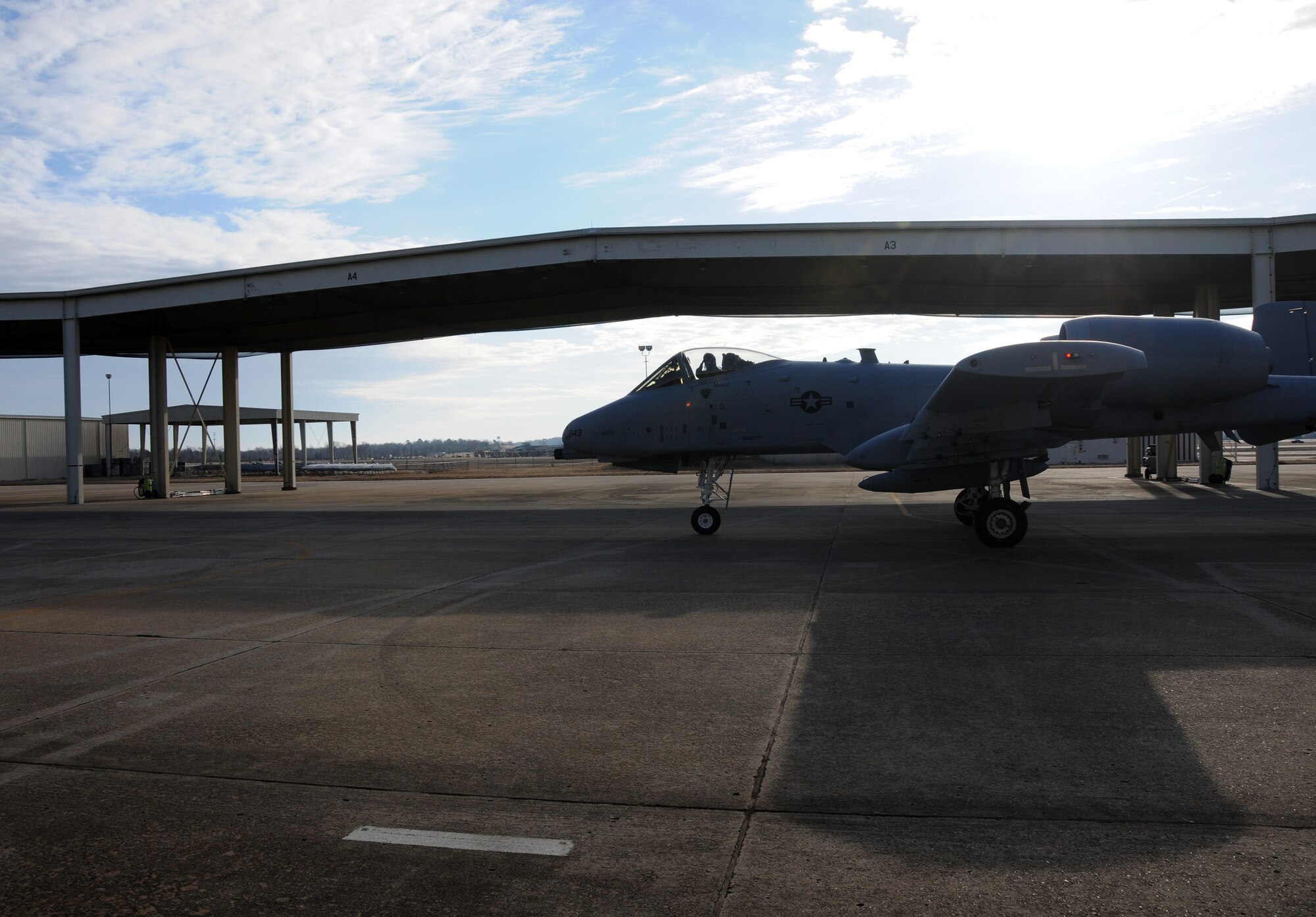 Lt. Col. John Gonzales, 23rd Operations Support Squadron commander, salutes Master Sgt. Michael Wilmoth, a crew chief with the 188th Aircraft Maintenance Squadron, as he taxies to the runway at Ebbing Air National Guard Base, Ark., Feb. 11, 2014. Gonzales delivered Tail No. 649, one of the 188th’s A-10C Thunderbolt II “Warthogs,” to Moody Air Force Base, Ga., as part of the 188th’s conversion from an A-10 mission to a remotely piloted aircraft, intelligence and targeting mission. The 188th now has seven A-10s remaining on station. The last two Warthogs are slated to depart in June 2014. (U.S. Air National Guard photo by Senior Airman John Hillier/released)