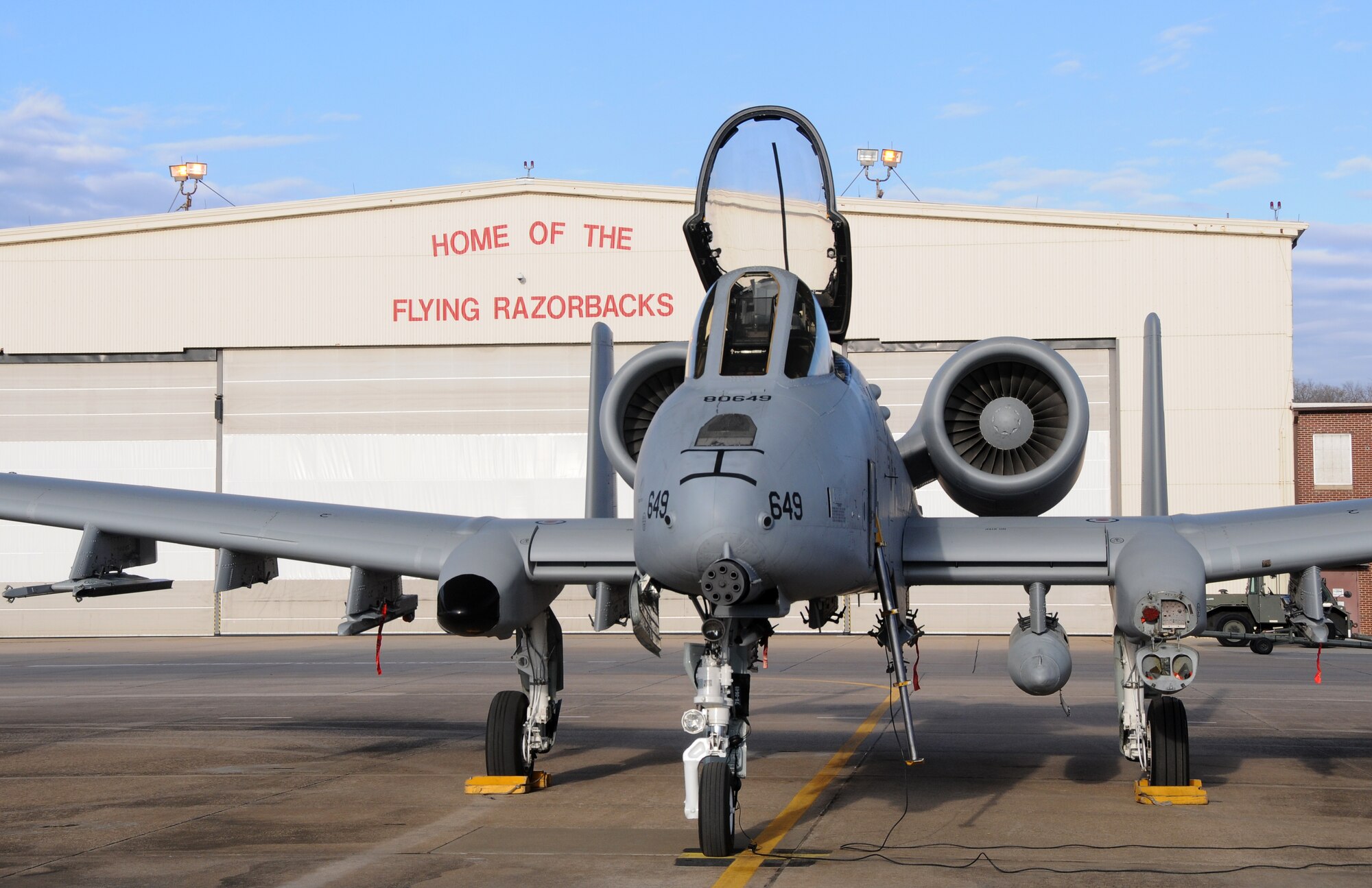 A 188th Fighter Wing A-10C Thunderbolt II “Warthog” waits in the morning sun to begin its journey from Ebbing Air National Guard Base in Fort Smith, Ark. to Moody Air Force Base, Ga., Feb. 11, 2014. Tail No. 649 is being delivered to Moody’s 23rd Wing as part of the 188th’s conversion from A-10s to remotely piloted aircraft and an intelligence and targeting mission. The 188th now has seven A-10s remaining on station. The last two Warthogs are slated to depart in June 2014. (U.S. Air National Guard photo by Senior Airman John Hillier/released)