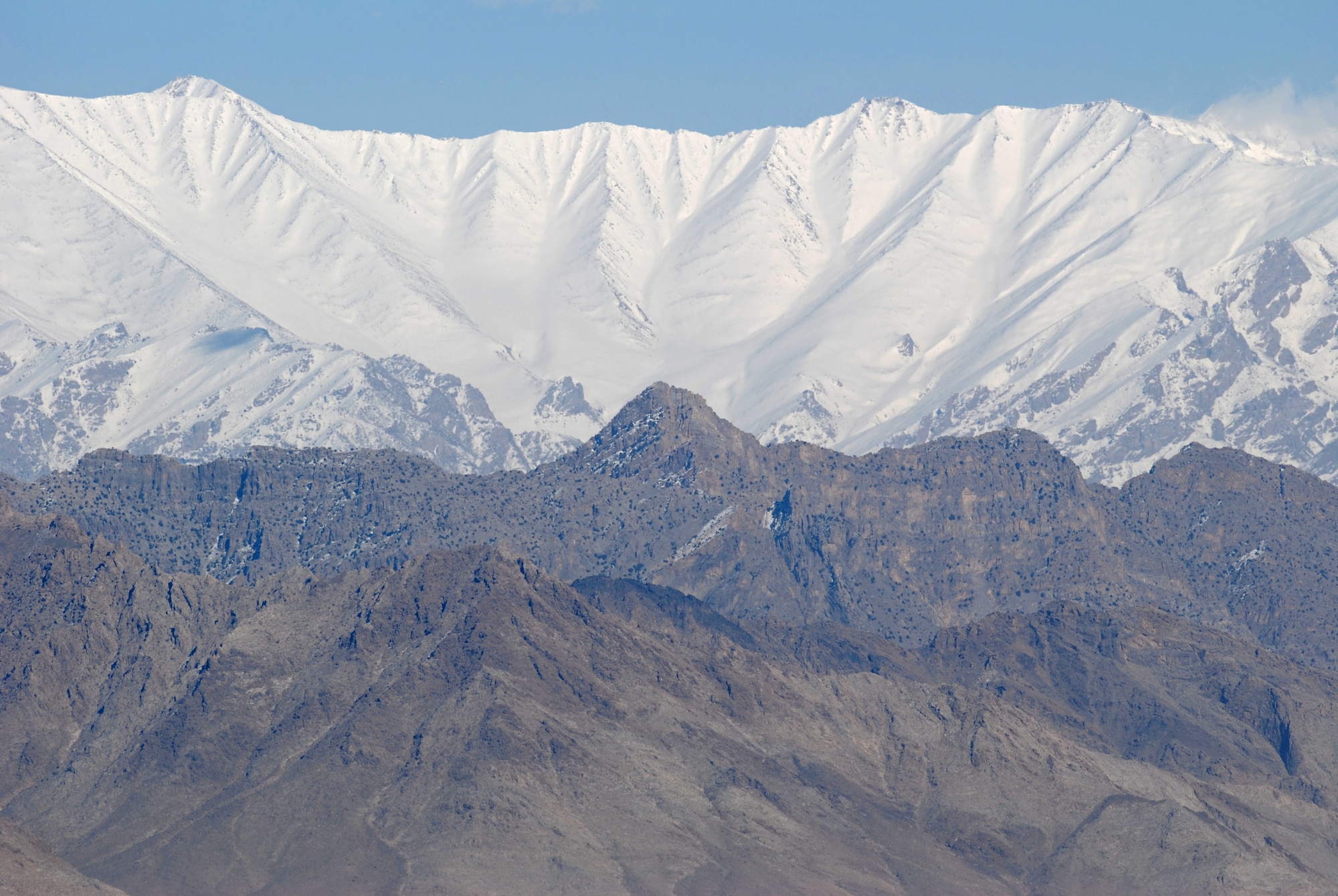 Rugged mountains surround at Bagram Airfield, Afghanistan. Clear skies on Feb. 15, 2014 allowed for a clear view of the surrounding mountains. (U.S. Air Force photo by Capt. Brian Wagner/Released)