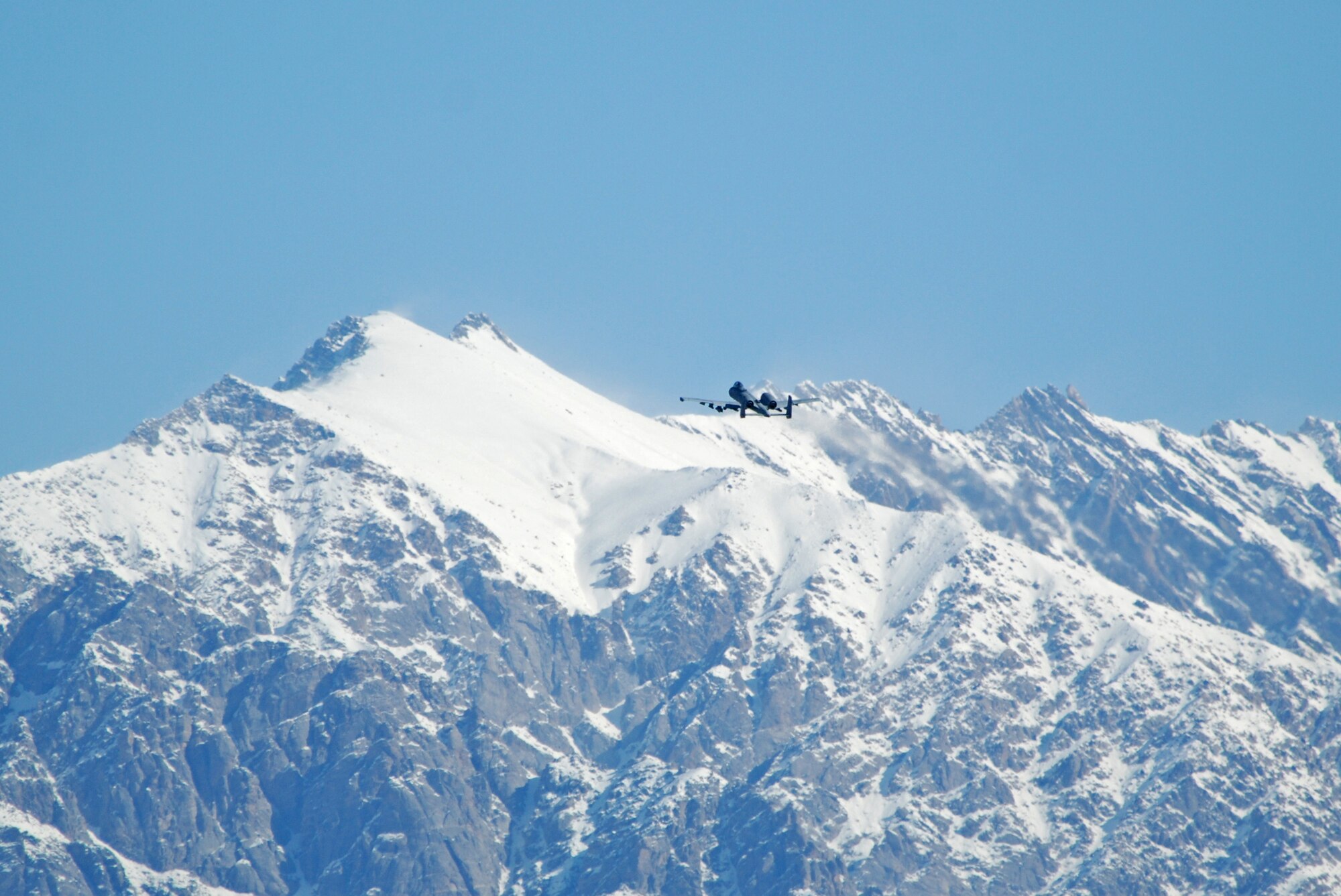 An A-10 Thunderbolt II departs from Bagram Airfield, Afghanistan, Feb. 15, 2014. Strong winds allowed a clear sky during the morning. (U.S. Air Force photo by Capt. Brian Wagner/Released)