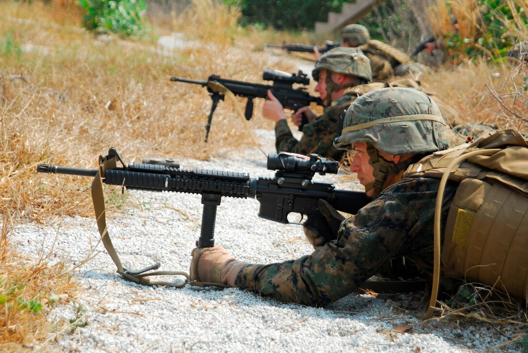 Hat Yao, Thailand – U.S. Marines secure a beach during an amphibious demonstration at Hat Yao Beach, Kingdom of Thailand Feb. 14 during exercise Cobra Gold 2014. The demonstration also included members from the Royal Thai and Republic of Korea Marine Corps. Cobra Gold, in its 33rd iteration, is designed to advance regional security in the Asia Pacific region. The U.S. Marines are with 3rd Battalion, 1st Marine Regiment, currently assigned to 4th Marine Regiment, 3rd Marine Division, III Marine Expeditionary Force under the unit deployment program (U.S. Navy photo by Mass Communication Specialist 1st Class Joy M. Kirch-Kelling/Release.)    