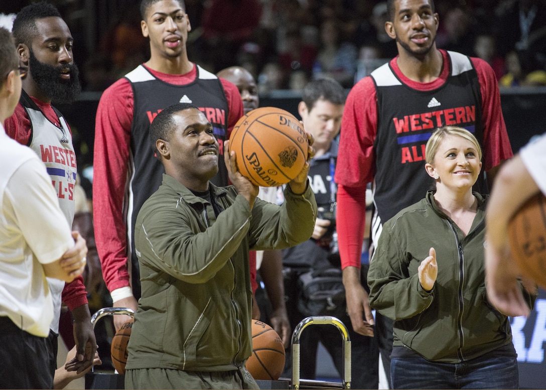 U.S. Marine Staff Sgt. Melvin Jackson, Recruiting Station Baton Rouge, Recruiting Sub-Station New Orleans, prepares to take a shot at the three-point line during the NBA’s All-Star East Team and West Team Practice inside the Ernest N. Morial Convention Center, New Orleans, La., Feb. 15, 2014. The Armed Forces community had the opportunity to participate in the 2014 NBA All-Star Weekend to highlight the military presence in the New Orleans area and support community outreach events. (U.S. Marine Corps photo by Lance Cpl. Mackenzie Schlueter/Released)
