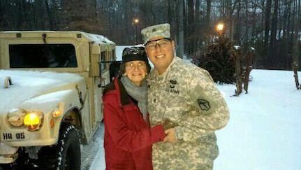 Staff Sgt. Timothy Bellinger, of Cumming, Ga. drove an 83-year-old woman home from a hospital when the storm rendered roads impassable to car traffic.