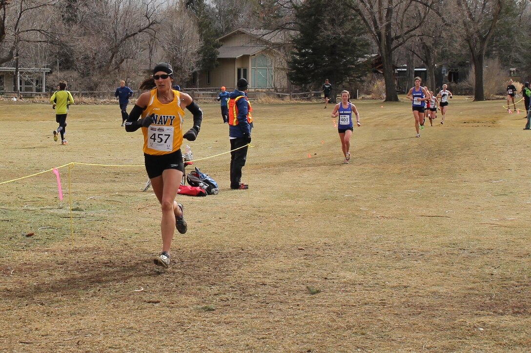 2013 Armed Forces Cross Country team member Navy LT Gina Slaby (NAS Little Creek, VA) takes second in the 2014 Armed Forces Cross Country Championship held in conjunction with the USA Track and Field Cross Country National Championship on 15 February in Boulder, Colo.