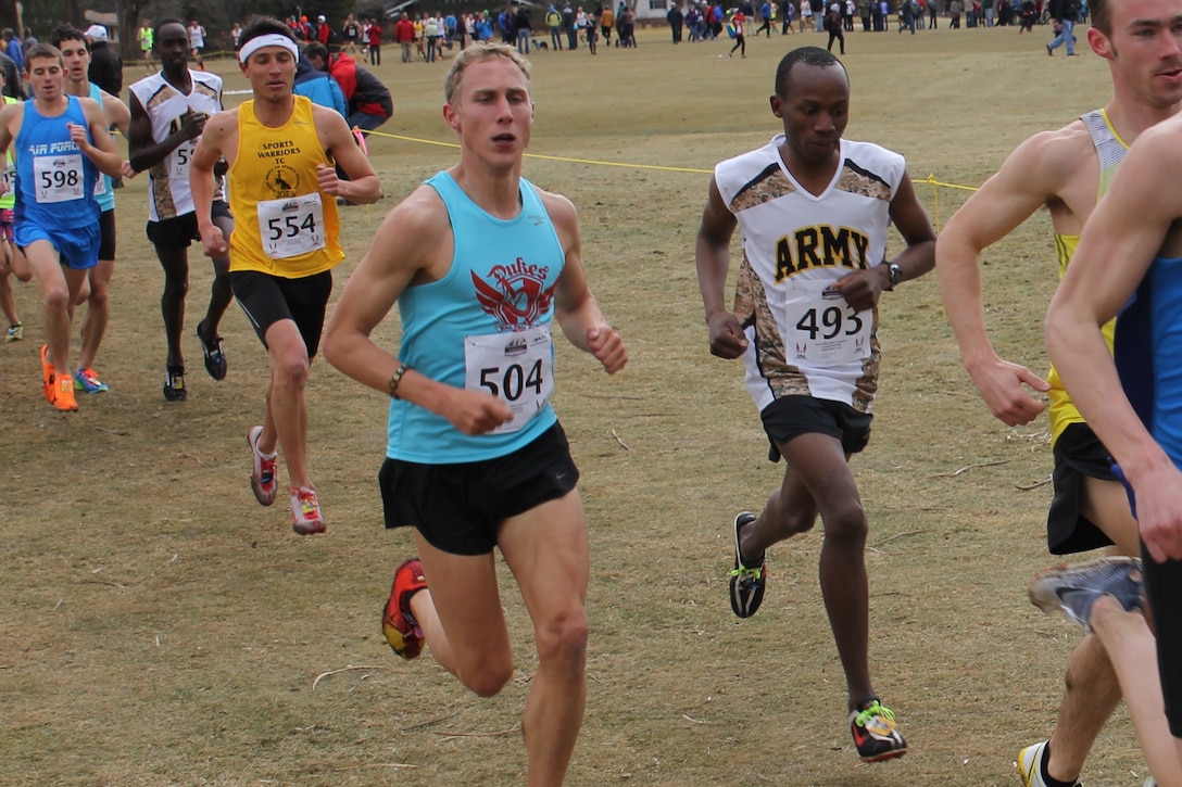 Army Specialist Hillary Bor (Fort Carson, CO) - Right (Bib# 493) captures the men's silver medal at the 2014 Armed Forces Cross Country Championship held in conjunction with the USA Track and Field Cross Country Championship in Boulder, CO on 15 February.