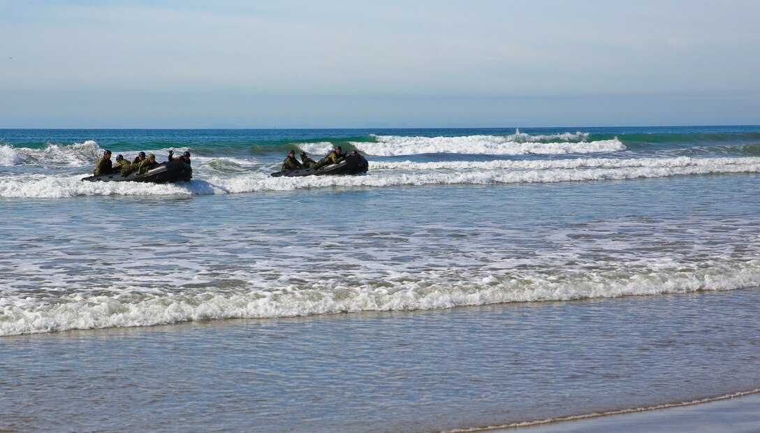 Soldiers from the Japan Ground Self-Defense Force perform a beach landing while conducting an amphibious raid during Exercise Iron Fist 2014 aboard Camp Pendleton, Calif., Feb. 15, 2014. Iron Fist is an amphibious exercise that brings together Marines and sailors from the 15th Marine Expeditionary Unit, other I Marine Expeditionary Force units, and soldiers from the JGSDF, to promote military interoperability and hone individual and small-unit skills through challenging, complex and realistic training. (U.S. Marine Corps photo by Lance Cpl. Ricardo Hurtado/Released)