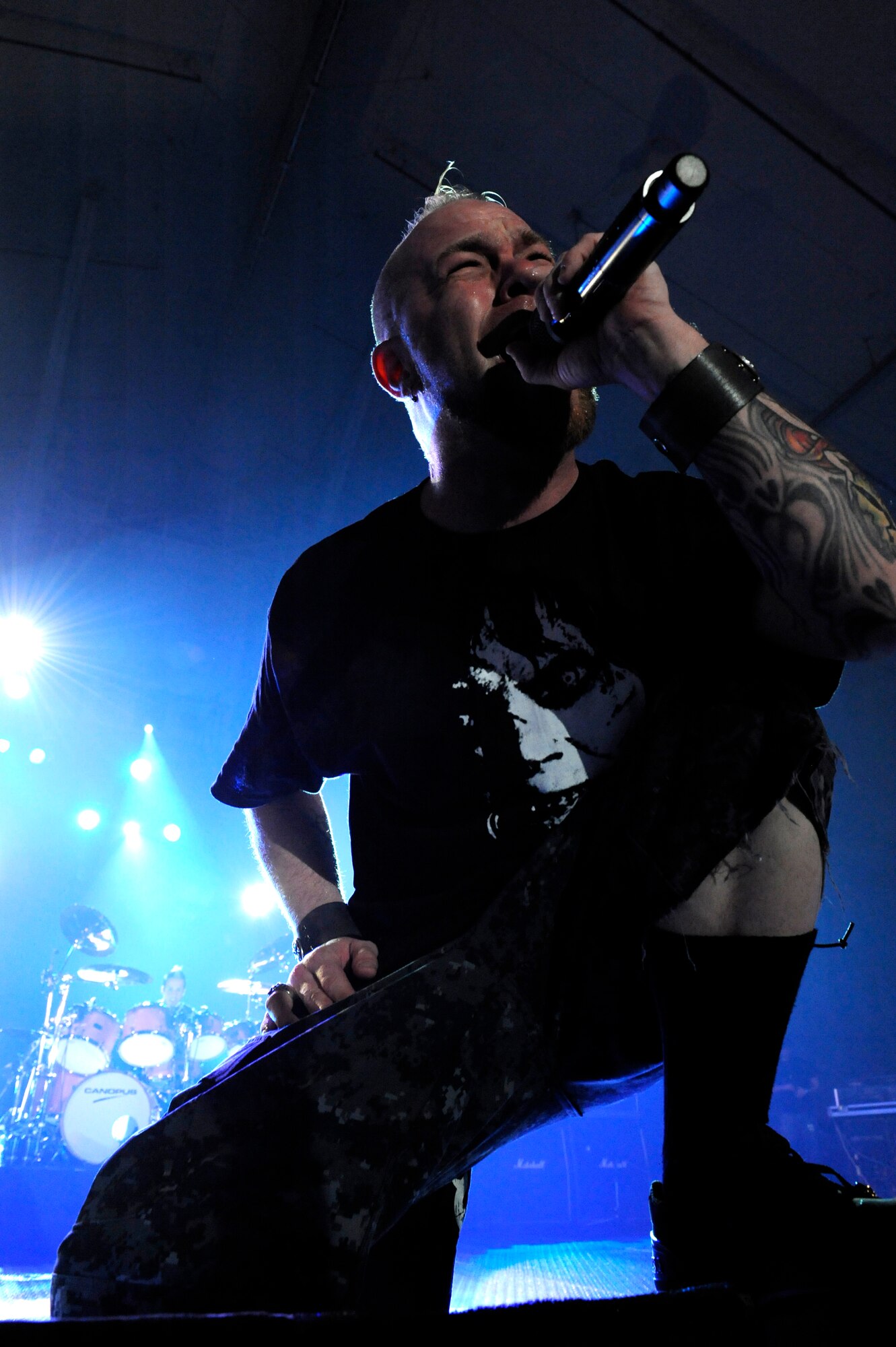 Heavy metal band Five Finger Death Punch lead singer, Ivan Moody, sings ?Hard to See? during a concert on Kadena Air Base, Japan, Feb. 16, 2014. During their visit to Kadena, FFDP members met with Airmen during breakfast and lunch meet-and-greets and put on a free concert for U.S. service members on-island. (U.S. Air Force photo by Senior Airman Maeson L. Elleman)