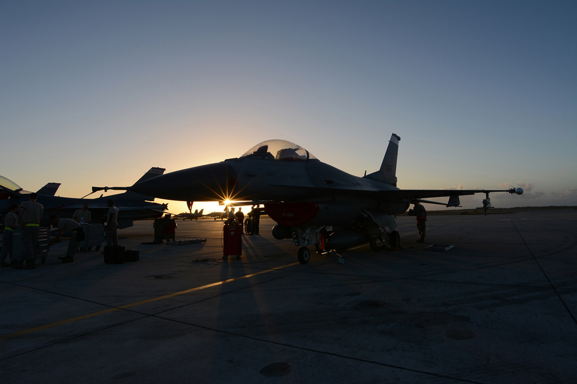 An Air National Guard F-16 Fighting Falcon sits on the flightline at Naval Air Station Key West, Key West, Fla., Feb. 4, 2014. Eight F-16s came to Florida to avoid weather cancelations they may have experienced back home. The deployment allowed pilots to test their expertise against dissimilar aircraft. (Air National Guard photo by Senior Airman Andrea F. Liechti)