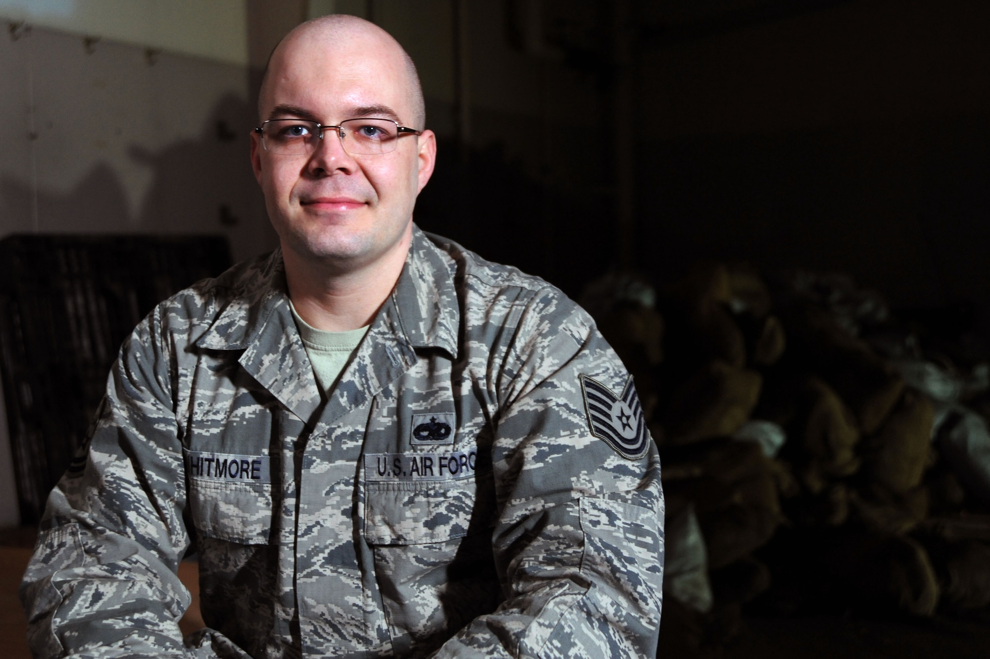 Tech. Sgt. Christopher Whitmore, 35th Maintenance Squadron unit deployment manager, prepares for an interview in the 35 MXS deployment line area at Misawa Air Base, Japan, Feb. 18, 2014. As a UDM, Whitmore is responsible for maintaining deployment records for more than 500 maintainers and was selected as the Wild Weasel of the Week for his superior performance, outstanding work ethic, and overall good conduct and discipline. (U.S. Air Force photo/Senior Airman Derek VanHorn)