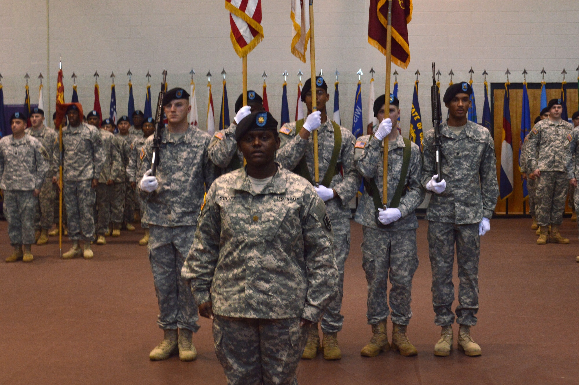 U.S. Army Maj. Clarisse Scott, a native of Elliot, S.C., stands with members of the 53rd Transportation Battalion, 7th Transportation Brigade (Expeditionary) during a change of command ceremony at Fort Eustis, Va., Feb. 18. The battalion conducts movement control operations in order to facilitate forces deploying to and from the U.S. Central Command area of responsibility. (U.S. Army photo by Sgt. Stefanie Warner/Released)