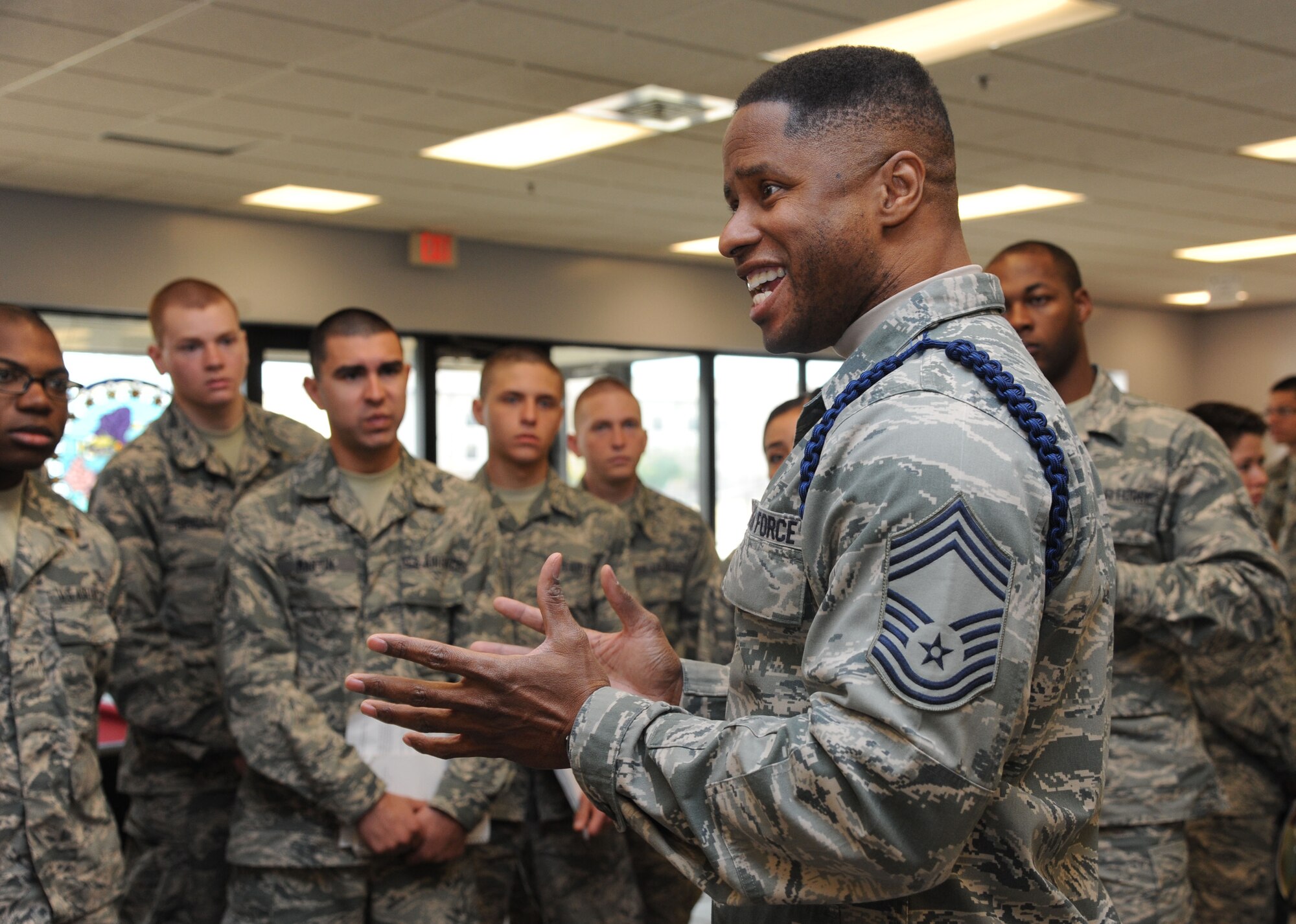 Chief Master Sgt. Roderick Cunningham, Air Force Reserves Center, speaks to Keesler technical training students about the Air Guard, National Guard and Reserve units and what they have to offer during the “Right Start” program Feb. 14, 2014, at the Levitow Training Support Facility, Keesler Air Force Base, Miss.  The “Right Start” program, which replaced seven hours of power point briefings, is an interactive program that allows the Airmen to get direct information from base support and morale agencies. (U.S. Air Force photo by Kemberly Groue)