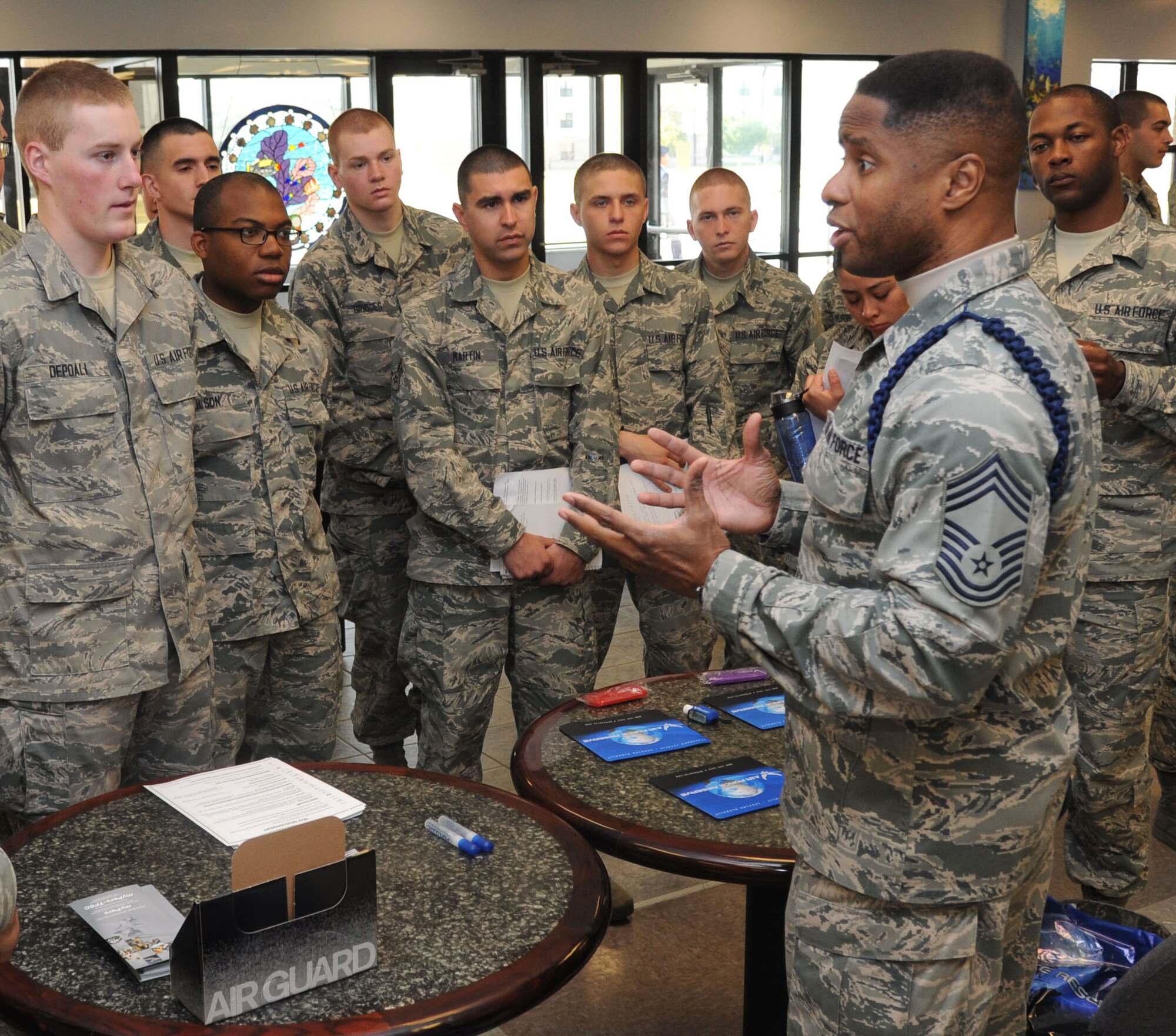 Chief Master Sgt. Roderick Cunningham, Air Force Reserves Center, speaks to Keesler technical training students about the Air Guard, National Guard and Reserve units and what they have to offer during the “Right Start” program Feb. 14, 2014, at the Levitow Training Support Facility, Keesler Air Force Base, Miss.  The “Right Start” program, which replaced seven hours of power point briefings, is an interactive program that allows the Airmen to get direct information from base support and morale agencies. (U.S. Air Force photo by Kemberly Groue)