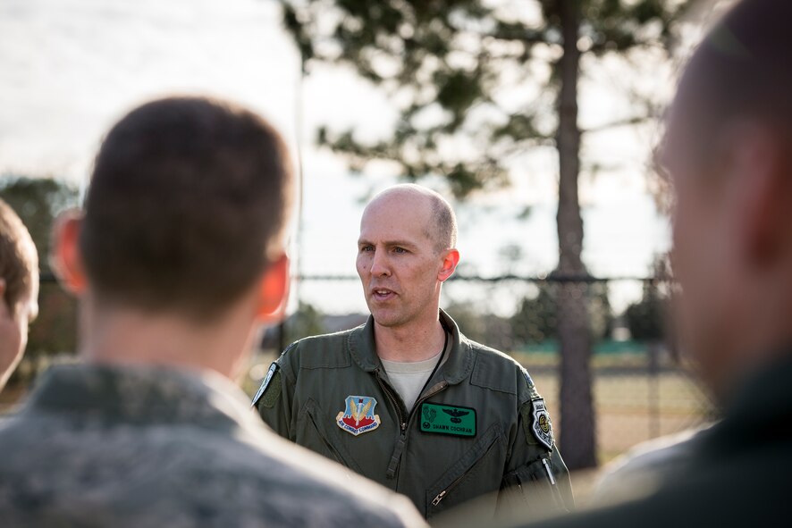 U.S. Air Force Lt. Col. Shawn Cochran, 41st Rescue Squadron commander, speaks to Airmen during a tree planting ceremony in remembrance of the crew members of the downed helicopter Jolly 22, an HH-60G Pave Hawk which crashed Jan. 7th on the Norfolk coast of England, at Moody Air Force base, Ga., Feb. 14, 2014. Cochran spoke of the connection they all share as part of the HH-60G Pave Hawk mission. (U.S. Air Force photo by Airman 1st Class Ryan Callaghan/Released)