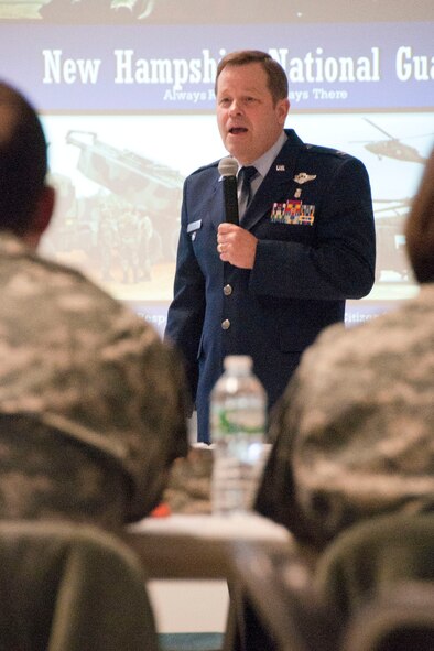 Air Force Col. Brett Wyrick, joint deputy surgeon, addresses an audience of N.H. Army and Air National Guard medical professionals during a N.H. Medical Symposium Feb. 9, 2014, Pease Air National Guard Base, Portsmouth, N.H. The Medical Symposium brought together senior leaders of the organization along with the medical staff from the Army and Air to build a shared understanding and to develop a way ahead for enhanced medical training, education and missions. (N.H. Air National Guard photo by Airman 1st Class Kayla McWalter/RELEASED)