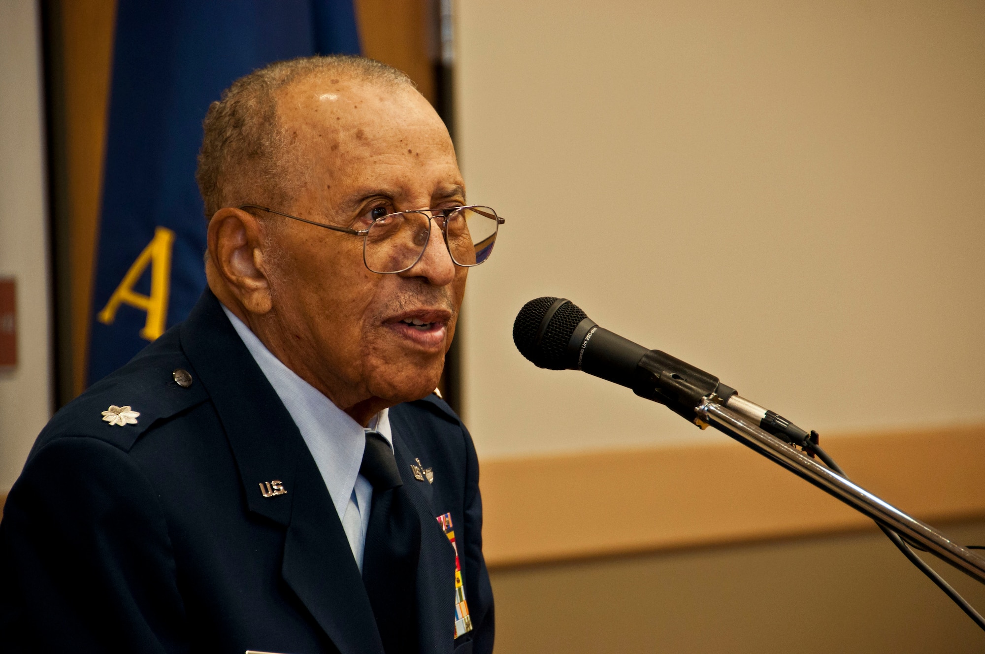Lt. Col. (ret.) James Warren, an original Tuskegee Airman, addresses the crowd at the Veterans Hall in Dixon, Ca. Feb. 6 after designating a 17-mile portion of Interstate 80 "Tuskegee Airmen Memorial Highway." (U.S. Air Force photo/Senior Airman Madelyn Brown)