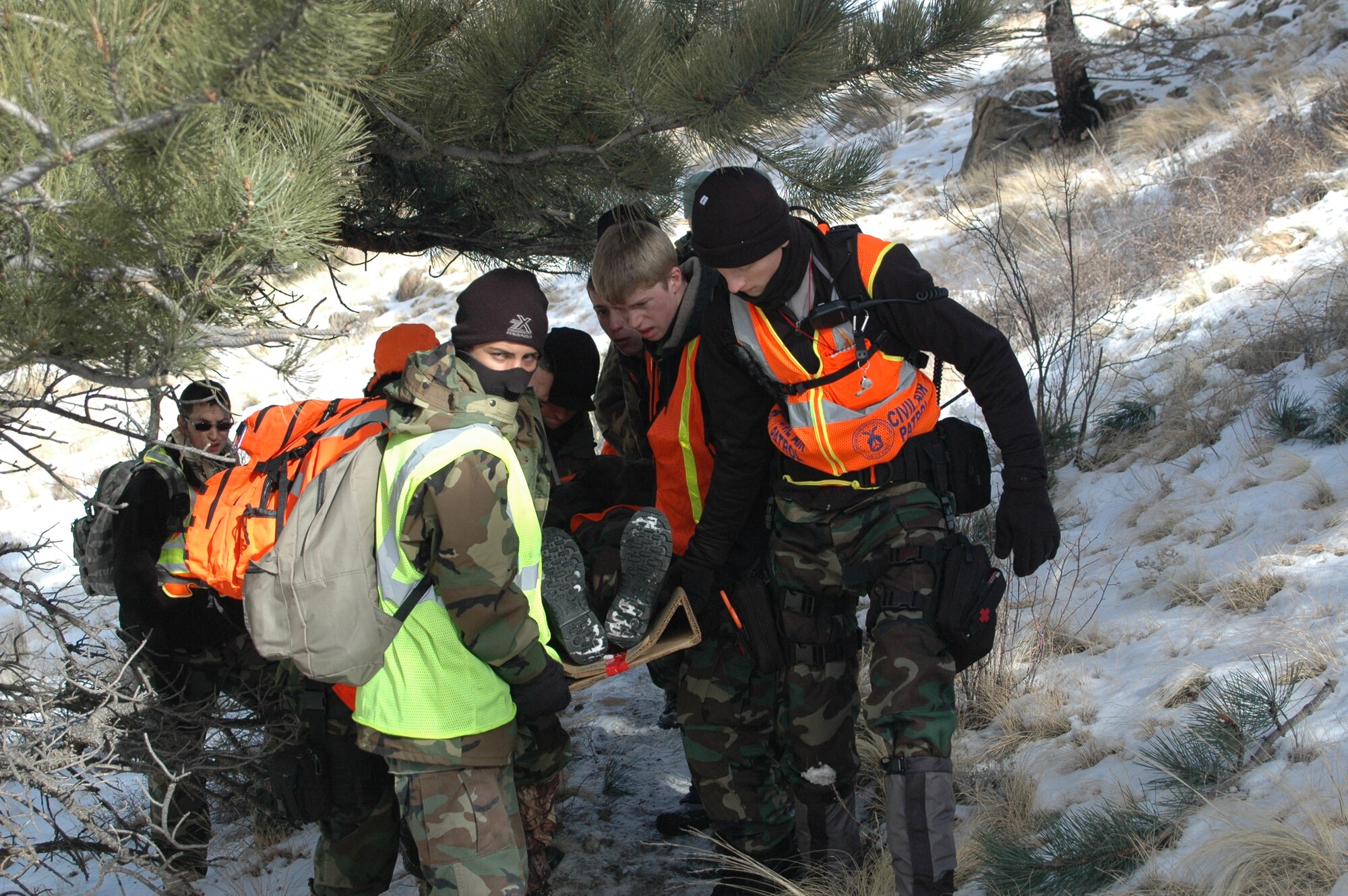 Cadets from the Colorado Springs Cadet Squadron at Peterson AFB participate in winter training. The training helped the cadets during a recent mission when they rescued a 66-year-old Kansas resident with Alzheimer’s Disease who was lost for two days in freezing conditions on the Colorado plains. (U.S. Air Force/file photo)