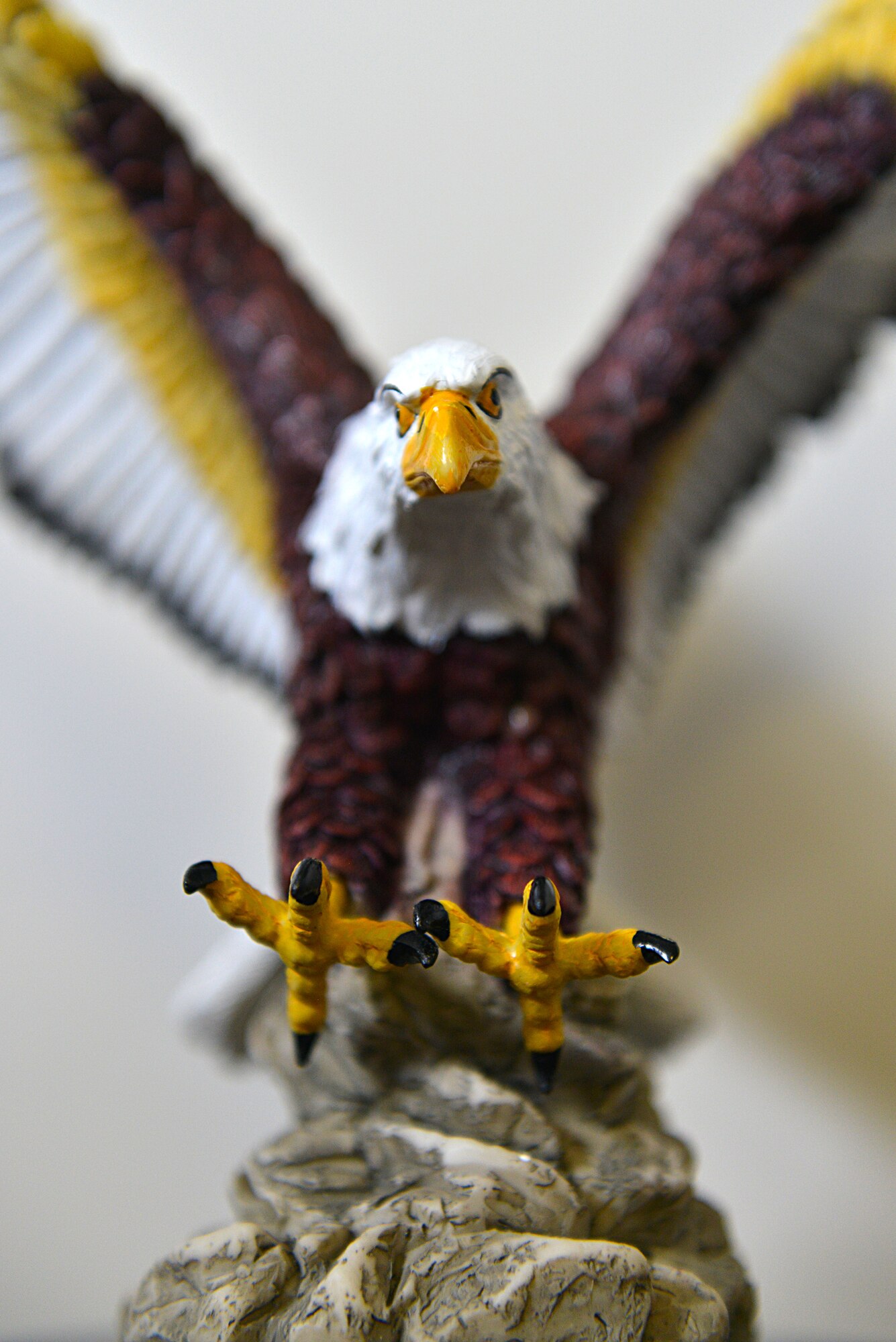 A statue of the American Bald Eagle, the national bird of the U.S.A., attached to the Military Citizen of the Year award, is displayed in the office of Master Sgt. John Yassu, 20th Maintenance Group first sergeant, Shaw Air Force Base, S.C., Feb. 14, 2014. The award is given by the Greater Sumter Chamber of Commerce to a military member at Shaw Air Force Base, who is an active volunteer supporting functions on base and within the local community. (U.S. Air Force photo by Airman 1st Class Jensen Stidham/Released)