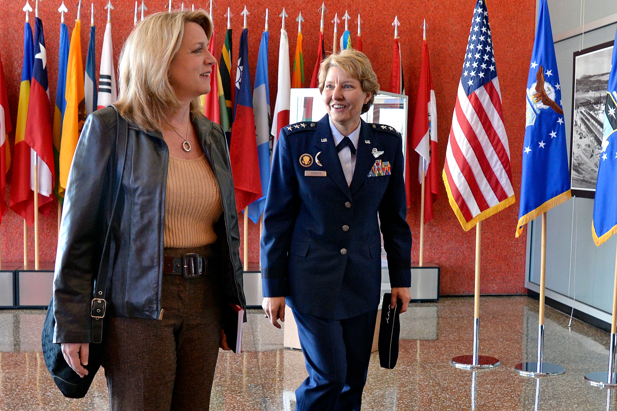 Secretary of the Air Force Deborah Lee James walks with Academy Superintendent Lt. Gen. Michelle D. Johnson in the lobby of Harmon Hall Feb. 13. During her two-day visit, James met with Academy Airmen and cadets and attended briefings on the Center for Character and Leadership Development and the essence of the Academy. (Air Force photo/Mike Kaplan)
