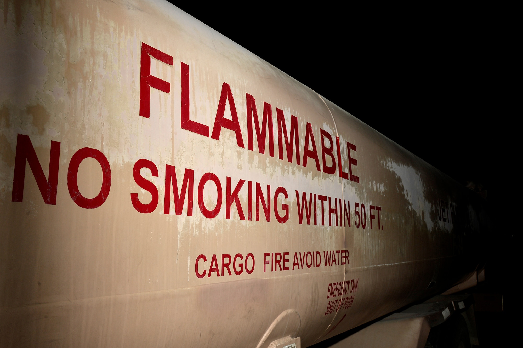 An R-11 Oshkosh refueling truck sits on the flight line at Bagram Airfield, Afghanistan, Feb. 14, 2014. The 455th Expeditionary Logistics Readiness Squadron petroleum, oil and lube shop uses the R-11 Oshkosh and the R-11 Kovatch refueling trucks to fuel the aircraft at Bagram. (U.S. Air Force photo by Senior Airman Kayla Newman/Released)