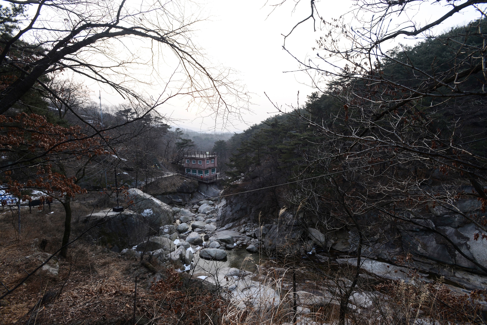 Bukhansan National Park, pictured here Feb. 16, 2014, in Seoul, Republic of Korea, houses numerous Buddhist temples and other man made structures in addition to the natural array of forest. The park is accessible via the Seoul metro system and public bus transit. (U.S. Air Force photo by Staff Sgt. Jake Barreiro)