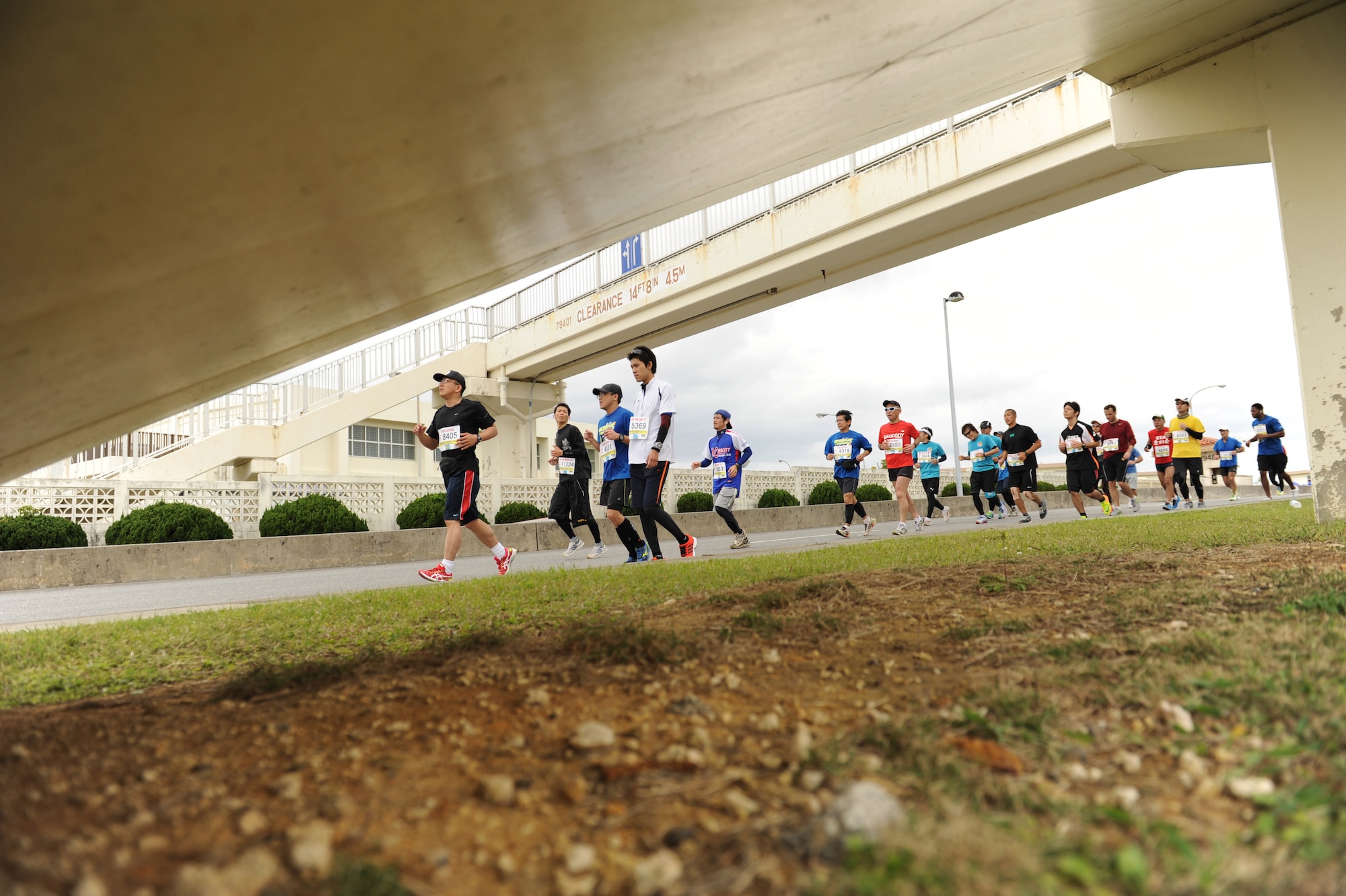 Local participants of the 2014 Okinawa Marathon run on Kadena Air Base, Japan, Feb.16, 2014. More than 11,000 runners signed up to run the Okinawa Marathon including more than 300 service members from around the island with a 73 percent completion rate. (U.S. Air Force photo by Airman 1st Class Keith James)