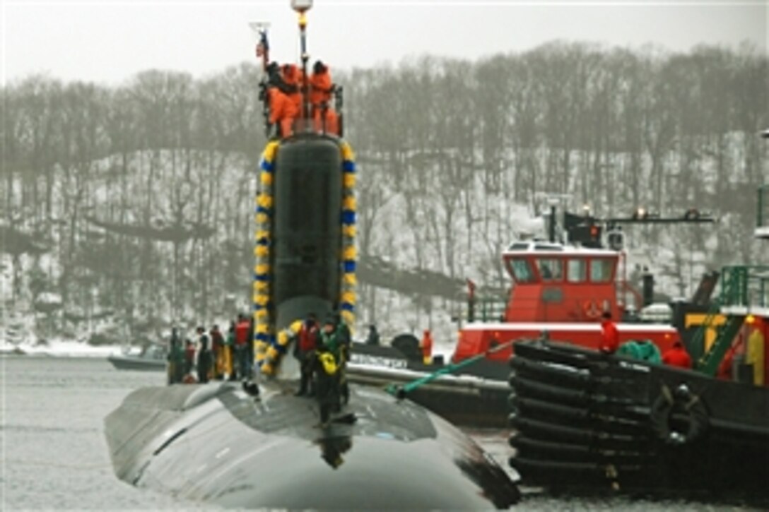 The attack submarine USS Virginia arrives at Naval Submarine Base New London in Groton, Conn., Feb. 13, 2014, after completing a scheduled six-month overseas deployment in the U.S. European Command area of responsibility.