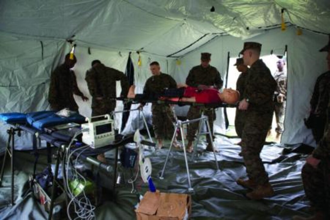 Sailors carry in a simulated casualty Feb. 4 on Camp Foster as part of a four-day medical exercise. “You have to push your body past the limits,” said Petty Officer 2nd Class Mason A. Ahmed, a hospital corpsman with 3rd Medical Battalion, 3rd Marine Logistics Group, III Marine Expeditionary Force. “It’s pretty hard but you need to keep your mind in the zone of just realizing that one day this could actually be real, and you need to realize that the patient is the most important thing, not you. So you just need to forget about how tired you are or anything like that and just keep pushing through and getting the job done.”


