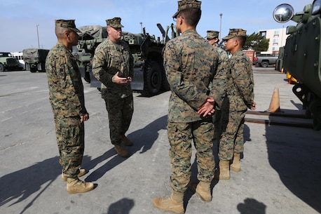 U.S. Marine Corps Col. Kurt A. Kempster Commanding Officer Combat Logistics Regiment 1 (CLR-1), speaks with junior Marines about their experiences during exercise Brilliant Scepter aboard Naval Amphibious Base Coronado, Coronado, Calif., February 18, 2014. Marines from CLR-1, Combat Logistics Battalion 5, and 7th Engineer Support Battalion worked along side naval units to conduct Maritime Prepositioning Force (MPF) training in preparation for their upcoming deployment to Jordan as part of Operation Eager Lion. MPF's serve as a naval power projection capability that supports the deployment and employment of Naval and Marine forces worldwide.