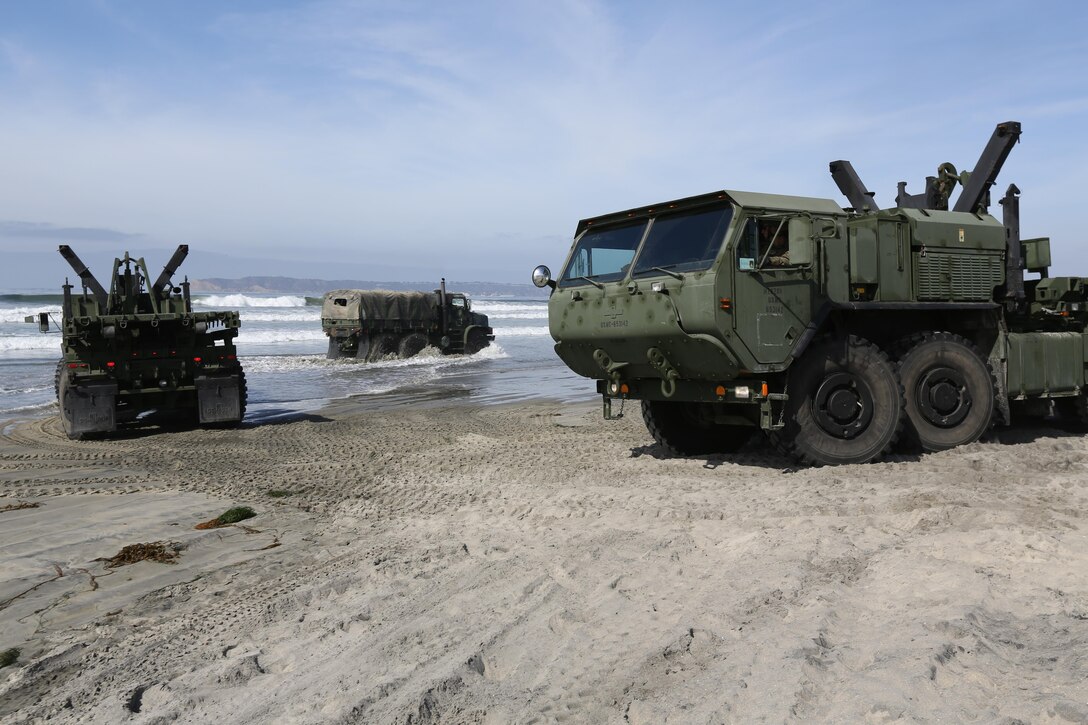 U.S. Marines with Combat Logistics Regiment 1 (CLR-1) operate Logistics Vehicle Service Replacement's (LVSR) during exercise Brilliant Scepter aboard Naval Amphibious Base Coronado, Coronado, Calif., February 18, 2014. Marines from CLR-1, Combat Logistics Battalion 5, and 7th Engineer Support Battalion worked along side naval units to conduct Maritime Prepositioning Force (MPF) training in preparation for their upcoming deployment to Jordan as part of Operation Eager Lion. MPF's serve as a naval power projection capability that supports the deployment and employment of Naval and Marine forces worldwide. 