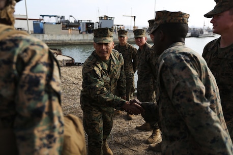 U.S. Marine Corps Sgt. Maj. Juan J. Diaz, Sergeant Major Combat Logistics Regiment 1 (CLR-1), speaks with junior Marines about their experiences during exercise Brilliant Scepter aboard Naval Amphibious Base Coronado, Coronado, Calif., February 18, 2014. Marines from CLR-1, Combat Logistics Battalion 5, and 7th Engineer Support Battalion worked along side naval units to conduct Maritime Prepositioning Force (MPF) training in preparation for their upcoming deployment to Jordan as part of Operation Eager Lion. MPF's serve as a naval power projection capability that supports the deployment and employment of Naval and Marine forces worldwide.