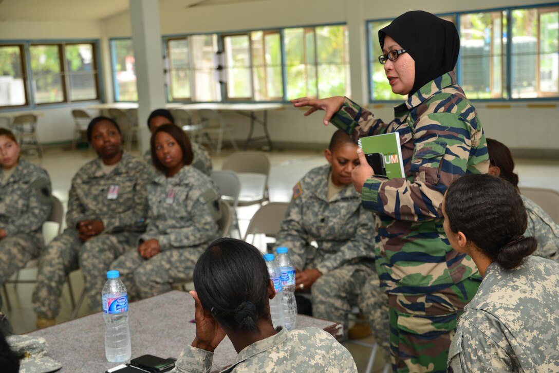 Lieutenant Col. Salawati Yahaa, an officer from the Malaysian Joint Force Headquarters, shared her experience with prioritizing and balancing from the perspective of being both a mother of four while continuing to serve her country at the first international Sisters in Arms during Cobra Gold 2014.