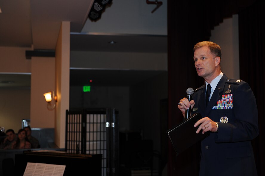 U.S. Air Force Chaplain (Col.) Dondi Costin, Pacific Air Forces Command Chaplain, speaks at the National Prayer Luncheon at the Kadena Officer's Club on Kadena Air Base, Japan, Feb. 19, 2014. Costin advises and represents the PACAF commander on all aspects of the Chaplain Corps mission in direct support of operations throughout the Pacific Region. (U.S. Air Force photo by Airman 1st Class Hailey R. Staker)