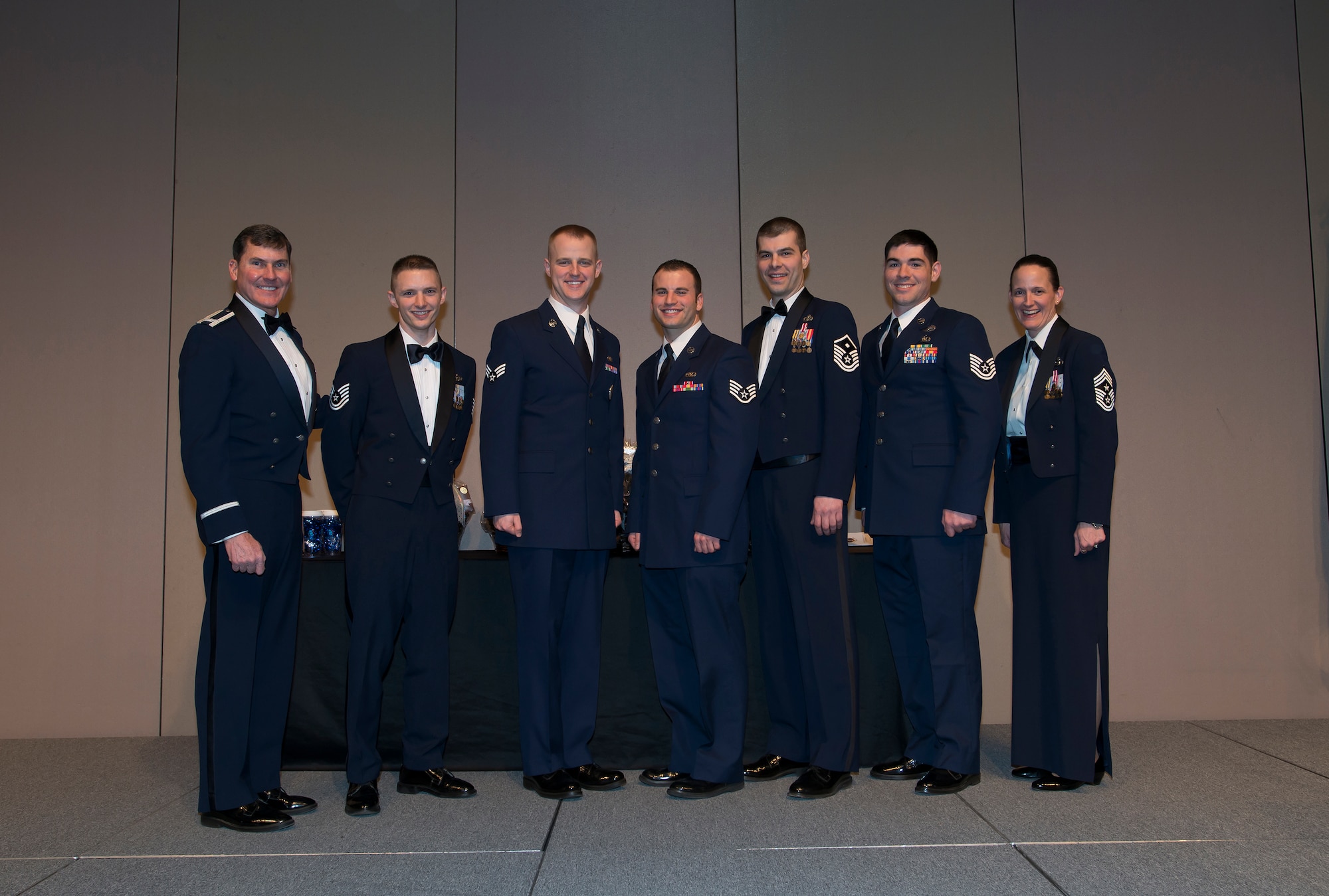 The winners of the Washington Air National Guard Annual Awards pose for a picture at the Spokane Convention Center, Spokane, Wash., Feb.8, 2014.  Pictured from L to R are Col. John S. Tuohy, Assistant Adjutant General - Air, Washington, Tech. Sgt. Christopher Marrazzo, 141st Operations Support Squadron, Senior Airman Jesse Clifford, Western Area Defense Sector, Staff Sgt. Nathan Lucas, Western Area Defense Sector, Master Sgt. John Lawton, 111th Air Support Operations Squadron, Tech. Sgt Cory Welton, 111th Air Support Operations Squadron and Chief Master Sgt. Trisha Almond, command chief Wash. Air National Guard. (U.S. Air National Guard photo by Tech. Sgt. Michael L. Brown/Released)