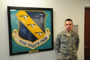 Airman 1st class Brian Puranen, 11th Logistics Readiness Squadron vehicle maintenance apprentice, has been recognized as this week's Warrior of the Week here on Feb. 19, 2014. Puranen overhauled a crash fire truck and rear axel units in seven hours as opposed to the normal 12, as well as performed triage maintenance on a snow broom returning the vehicle to service in six hours and restored 25 percent of snow removal capabilities. (U.S. Air Force Photo/Airman 1st Class Joshua R. M. Dewberry)