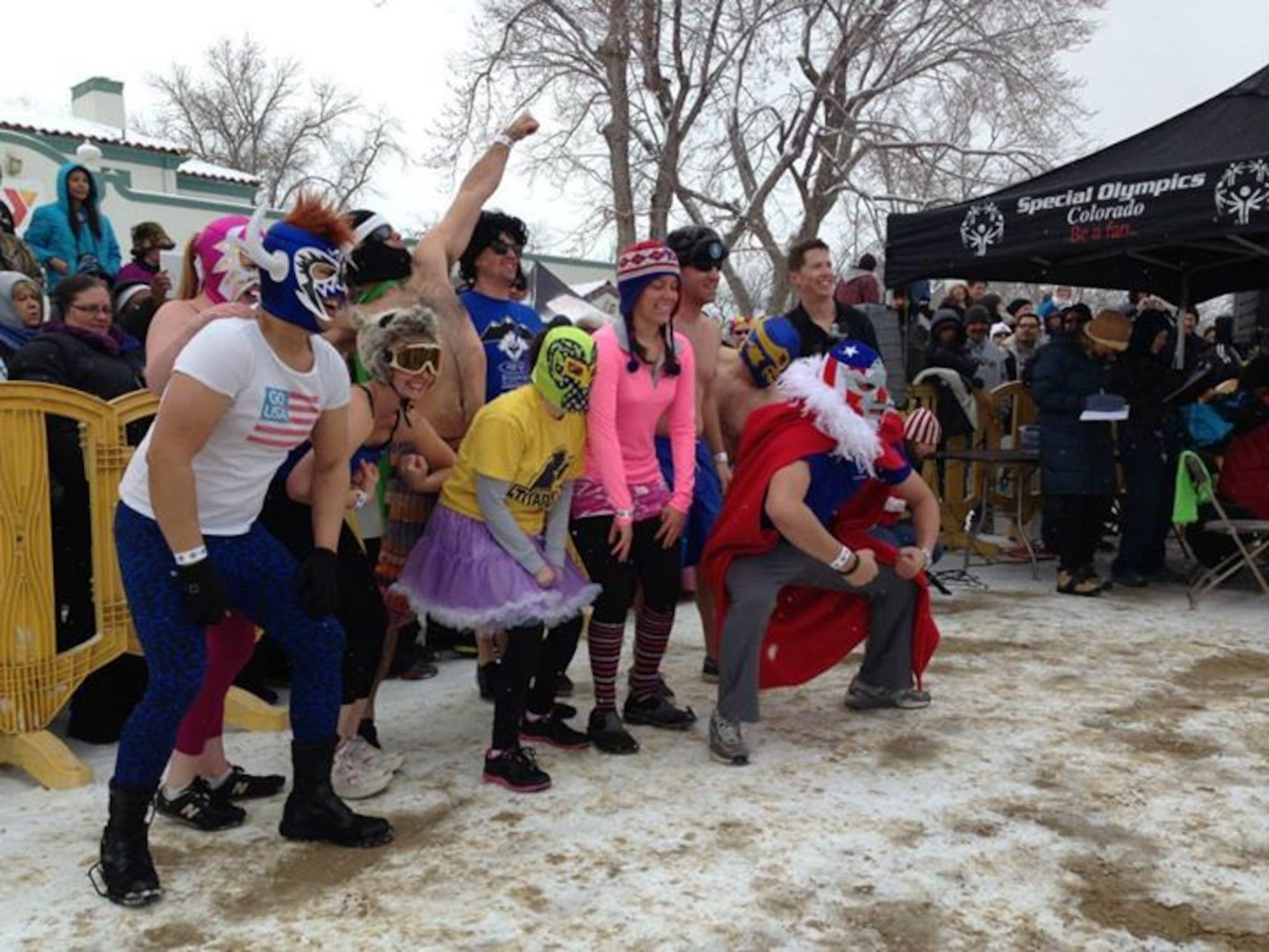 COLORADO SPRINGS, Colo. – The Luchadors from Peterson AFB line up for the Polar Plunge Feb. 1 at Colorado Springs’ Memorial Park. The group, along with about 180 others, raised nearly $35,000 for Special Olympics Colorado athletes during the plunge into the frigid 39 degree water. (U.S. Air Force photo/Tech. Sgt. William Gazzaway)