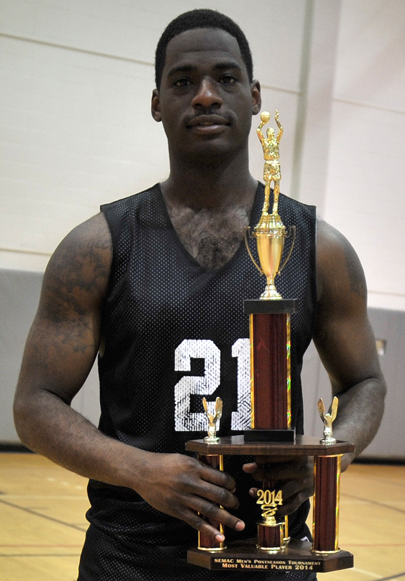 AJ Miller, Gordon Eagles forward, poses for a photo at the Southeast Military Athletic Conference Basketball Tournament at the Aderholt Fitness Center on Hurlburt Field, Fla., Feb. 17, 2014. Miller was recognized as the tournament’s Most Valuable Player. (U.S. Air Force photo/Senior Airman Kentavist P. Brackin) 