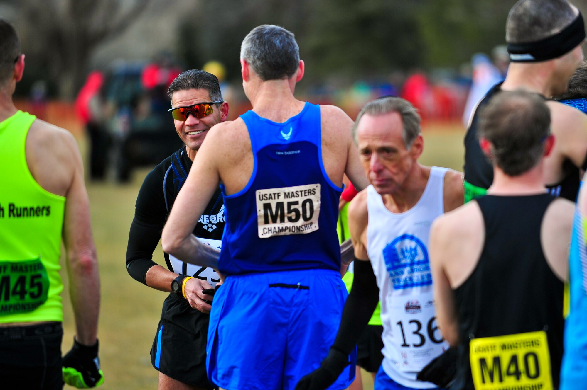 Air Force Reserve Chief Master Sgt. Alex C. Escarcega (wearing sunglasses) is in a good mood just minutes before his race February 15, 2014 at Flatirons Golf Course in Boulder, Colo. Escarcega was the sole AF Reservist to compete in the 2014 Armed Forces Cross-Country Championship’s 8 kilometer event. Escarcega finished with a time of 34:24 in the Men’s Master category. Escarcega is assigned to the 310th Operations Group at Schriever Air Force Base, Colo., and serves as the organization’s chief enlisted manager. (U.S. Air Force photo/Tech. Sgt. Nicholas B. Ontiveros)