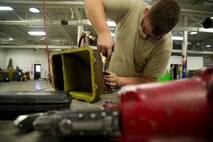 Airmen of the 5th Maintenance Squadron fabrication flight handle all aircraft assigned to Minot Air Force Base and schedules routine maintenance for each one. Some of the tasks the fabrication flight perform are: welding, engine repair, painting, machine work, searching for cracks and damaged parts, rivet work, creating screws and bolts, and even doing work for the 54th Helicopter Squadron. (U.S. Air Force photo/Senior Airman Brittany Y. Auld)