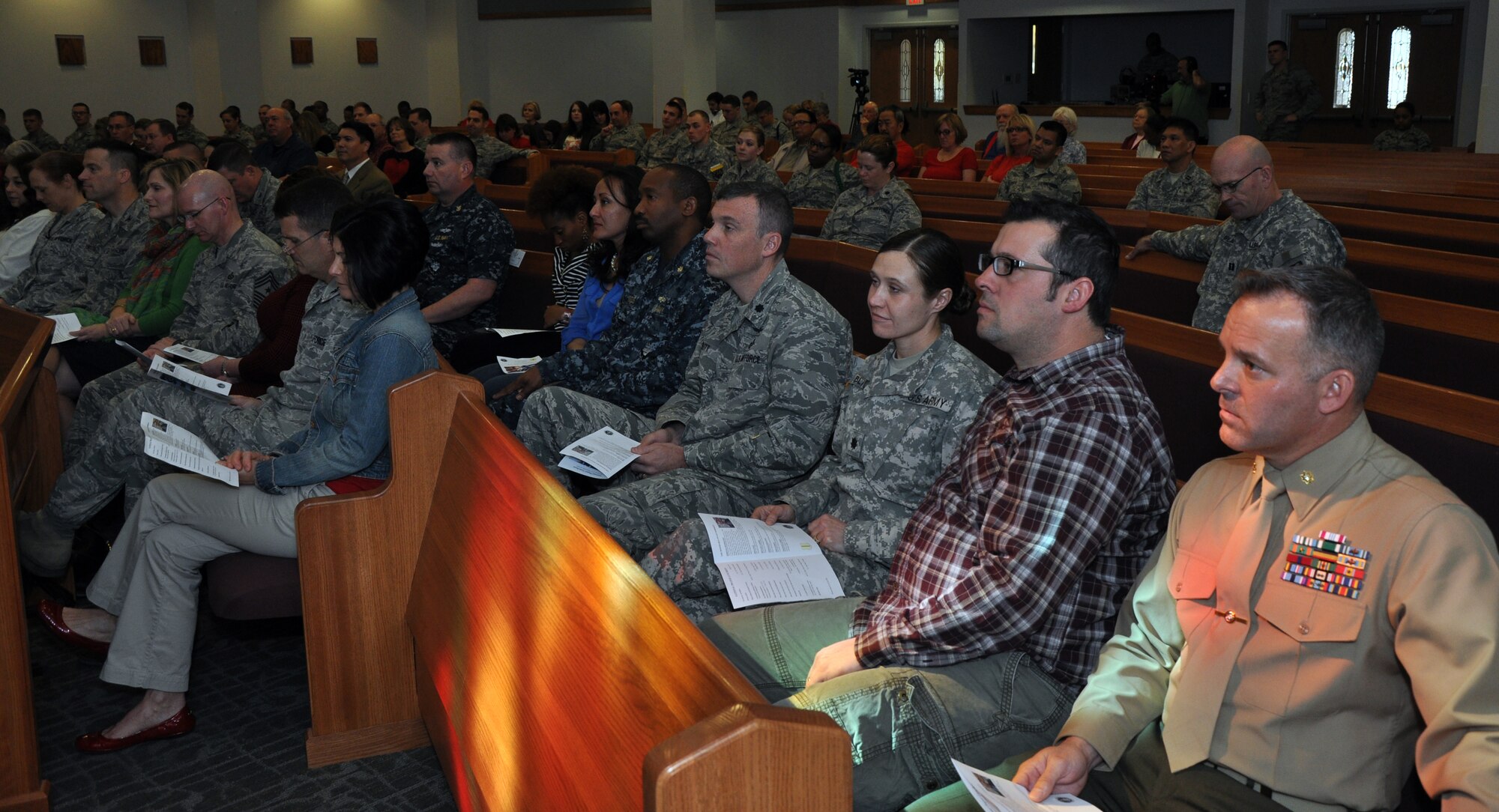 GOODFELLOW AIR FORCE BASE, Texas - Base leaders listen to prayers at the National Prayer Luncheon in the Taylor Chapel here Feb. 14. During the prayer service, base leaders read a Hebrew and a Christian scripture and the event was followed with a potluck luncheon. (U.S. Air Force photo/ Senior Airman Joshua Edwards)