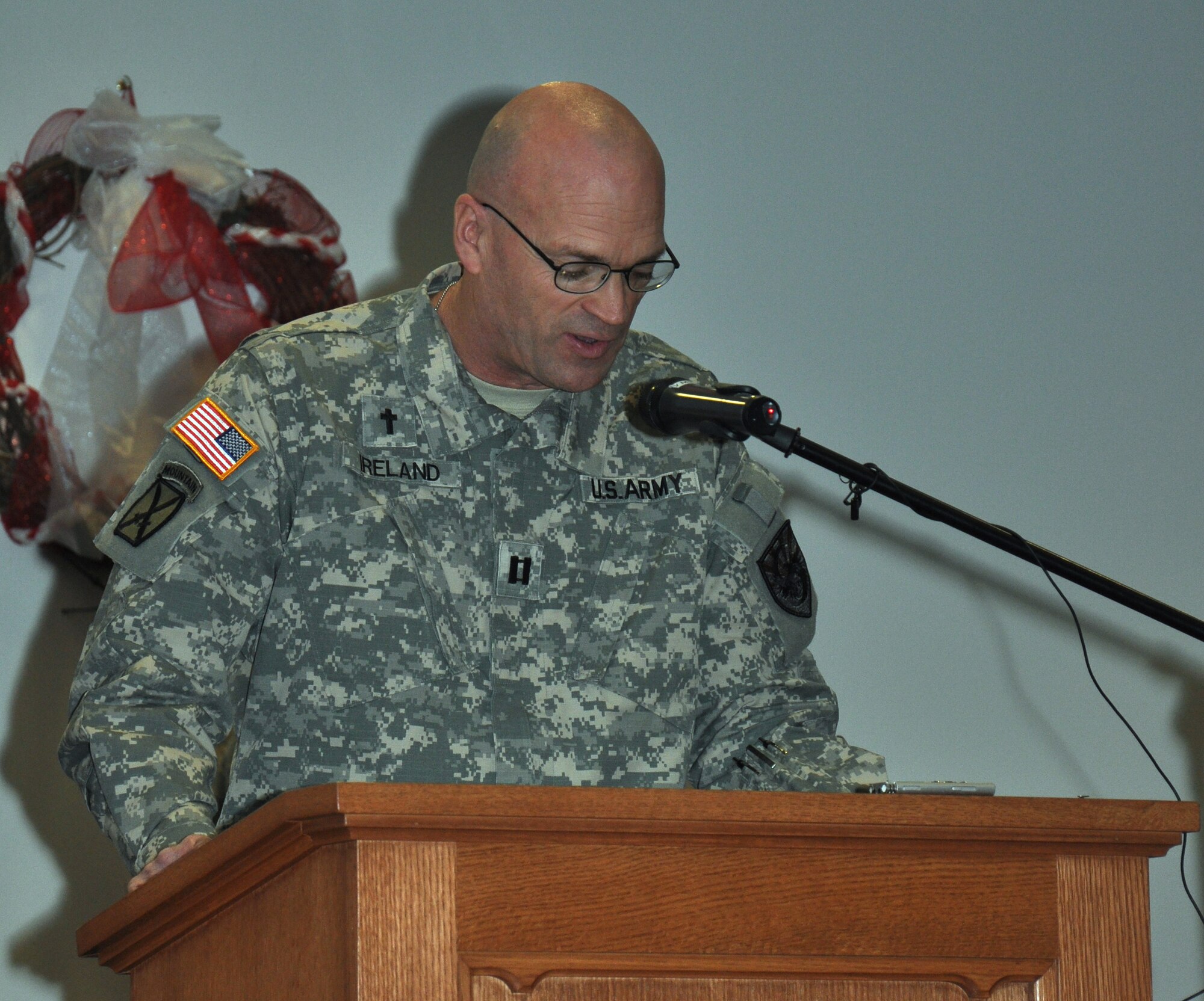 GOODFELLOW AIR FORCE BASE, Texas - Army Chaplain (Capt.) Patrick Ireland, Army 344th Military Intelligence Battalion, provides the invocation at the National Prayer Luncheon in the Taylor Chapel here Feb. 14. The luncheon featured the tenant unit commanders' prayers and a speech from San Angelo Mayor Dwain Morrison. (U.S. Air Force photo/ Senior Airman Joshua Edwards)