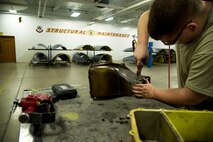 Airmen of the 5th Maintenance Squadron fabrication flight handle all aircraft assigned to Minot Air Force Base and schedules routine maintenance for each one. With Boeing no longer making many parts for the aging aircraft, the fabrication flight improvises and creates hand crafted solutions. Some of the tasks the fabrication flight perform are: welding, engine repair, painting, machine work, searching for cracks and damaged parts, rivet work, creating screws and bolts, and even doing work for the 54th Helicopter Squadron. (U.S. Air Force photo/Senior Airman Brittany Y. Auld)