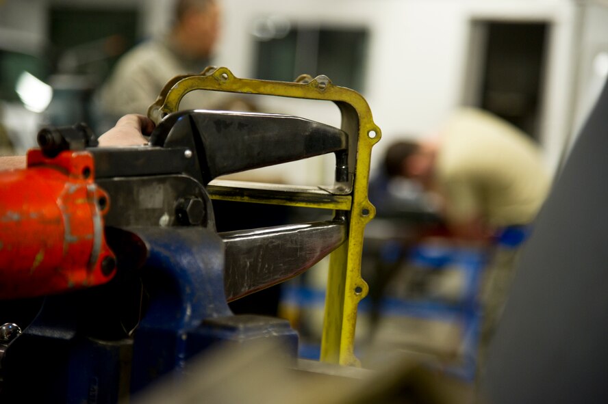 Airmen of the 5th Maintenance Squadron fabrication flight handle all aircraft assigned to Minot Air Force Base and schedules routine maintenance for each one. With Boeing no longer making many parts for the aging aircraft, the fabrication flight improvises and creates hand crafted solutions. Some of the tasks the fabrication flight perform are: welding, engine repair, painting, machine work, searching for cracks and damaged parts, rivet work, creating screws and bolts, and even doing work for the 54th Helicopter Squadron. (U.S. Air Force photo/Senior Airman Brittany Y. Auld)