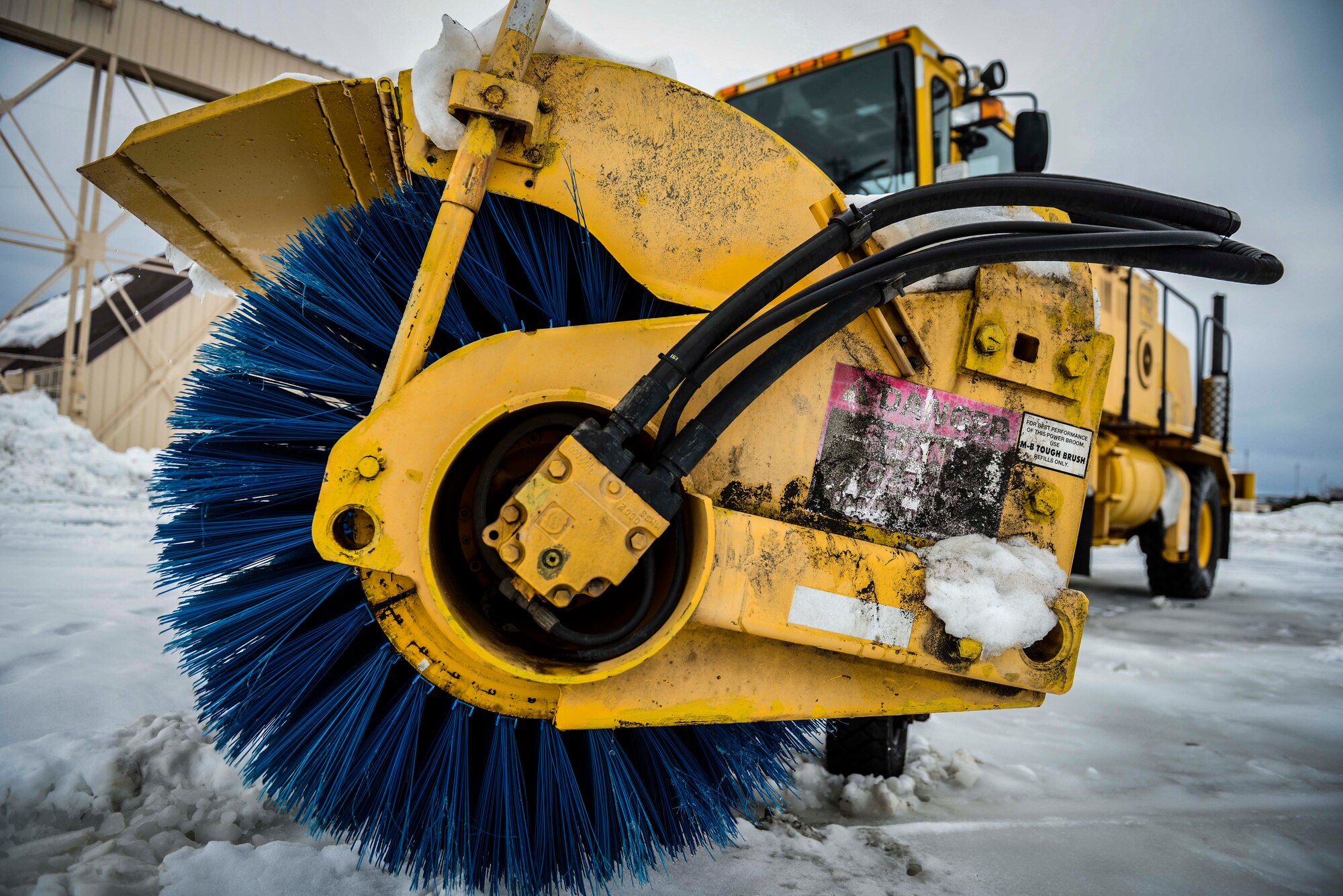 A snow removal vehicle sits on the flightline at Yokota Air Base, Feb. 15, 2014.  . The vehicle was used to clear the snow from the flightline and around base during the record-breaking snow storm that hit base..  (U.S. Air Force photo by Airman 1st Class Soo C. Kim / released)