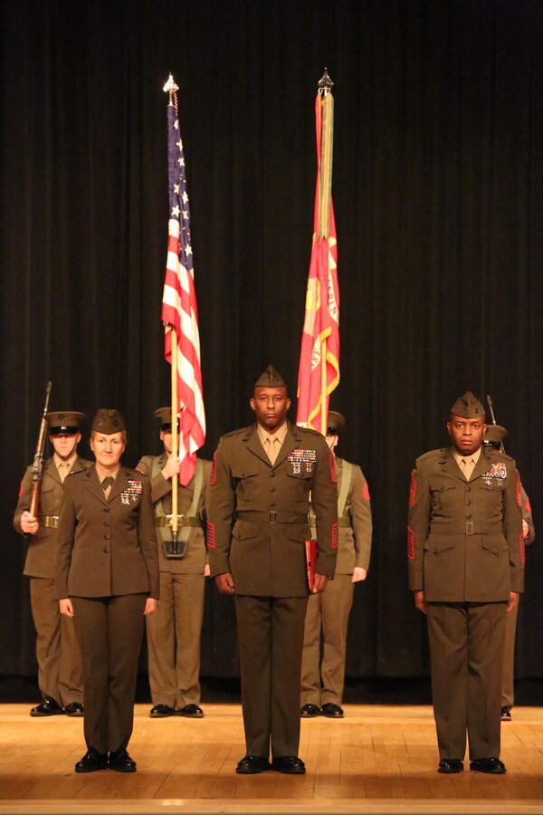 From the left, Col.  Robin Gallant, Headquarters and Service Battalion commanding officer; Sgt. Maj. Gerald Saunders, H&S Bn. sergeant major; and Sgt. Maj. Michael Moore, former H&S Bn. sergeant major; stand during a relief and appointment ceremony at Little Hall on Feb. 19, 2014. Moore has served at Quantico since May, 2011.  