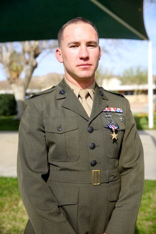 1st Lt. Kenneth Conover, executive officer, Weapons Company, 1st Battalion, 7th Marine Regiment, received the Silver Star Medal from Lt. Gen. John Toolan, commanding general of I Marine Expeditionary Force, during an award ceremony held at Marine Corps Air Ground Combat Center Twentynine Palms, Calif., Feb. 18, 2014. Conover, a Native of Fallbrook, Calif., was recognized for his heroic actions in Afghanistan where he held off multiple attacks over a six-day period. Conover saved the lives of multiple Marines during the operation. (U.S. Marine Corps Photo by Lance Cpl. Christopher J. Moore/released)